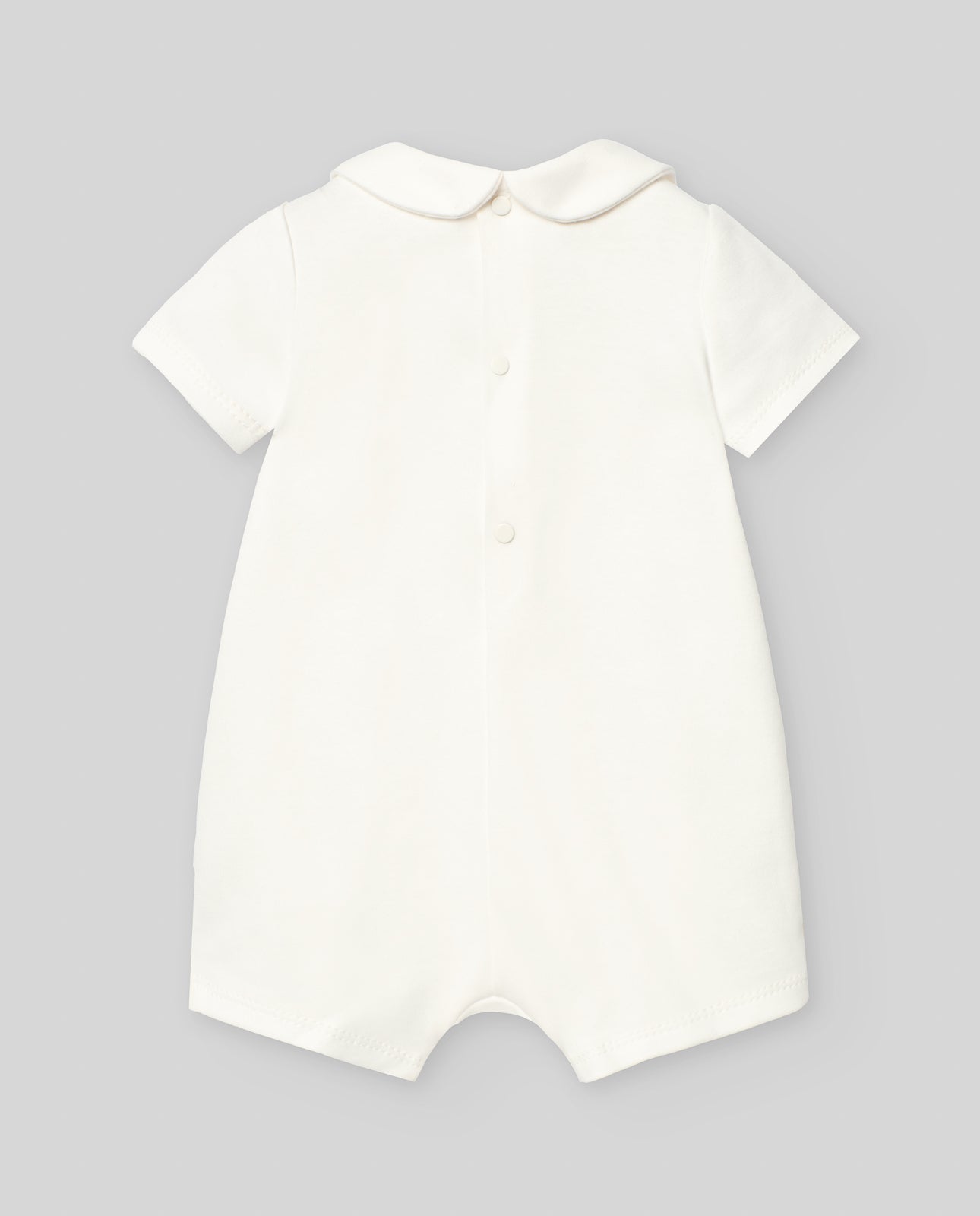 Pelele Corto Niña Cuello Nido de Abeja "Interlock" en Rosa Crudo/Crudo