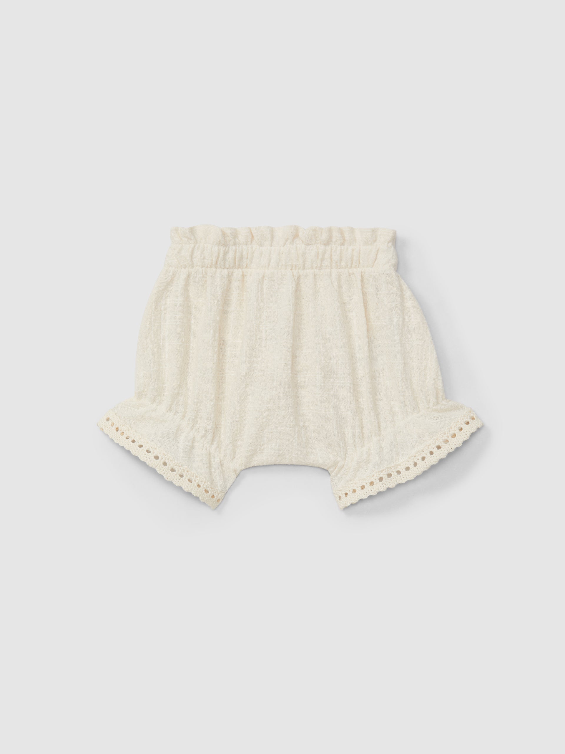 Blouse and shorts set with embroidery and lace details