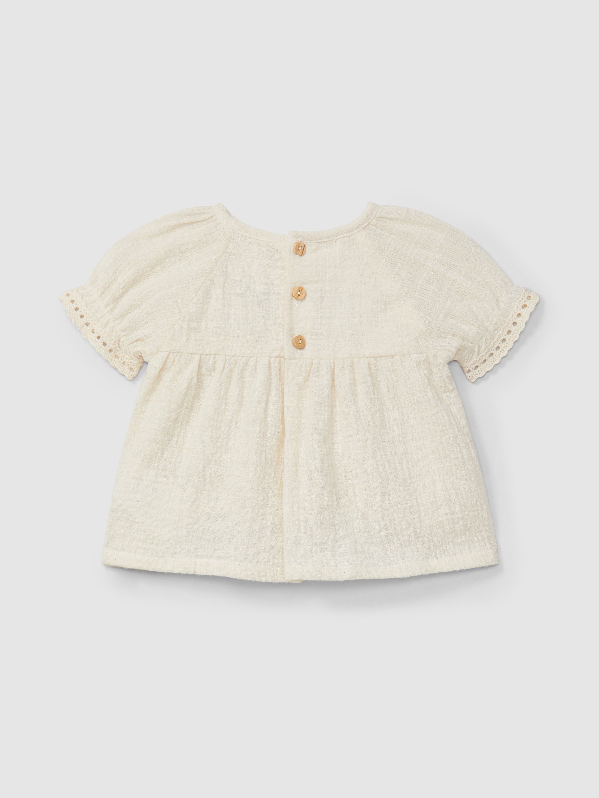 Blouse and shorts set with embroidery and lace details