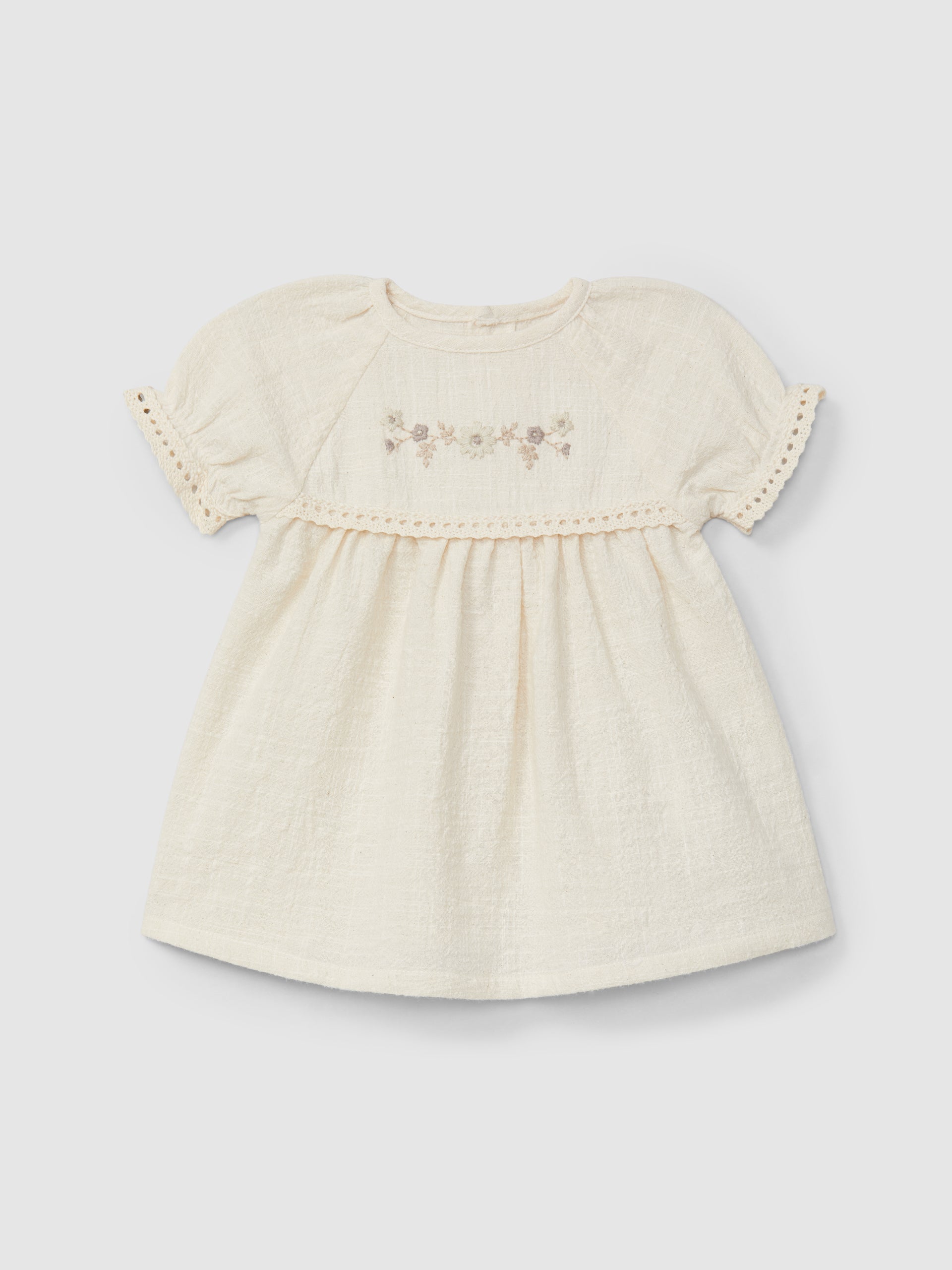 Dress with embroidery and lace details