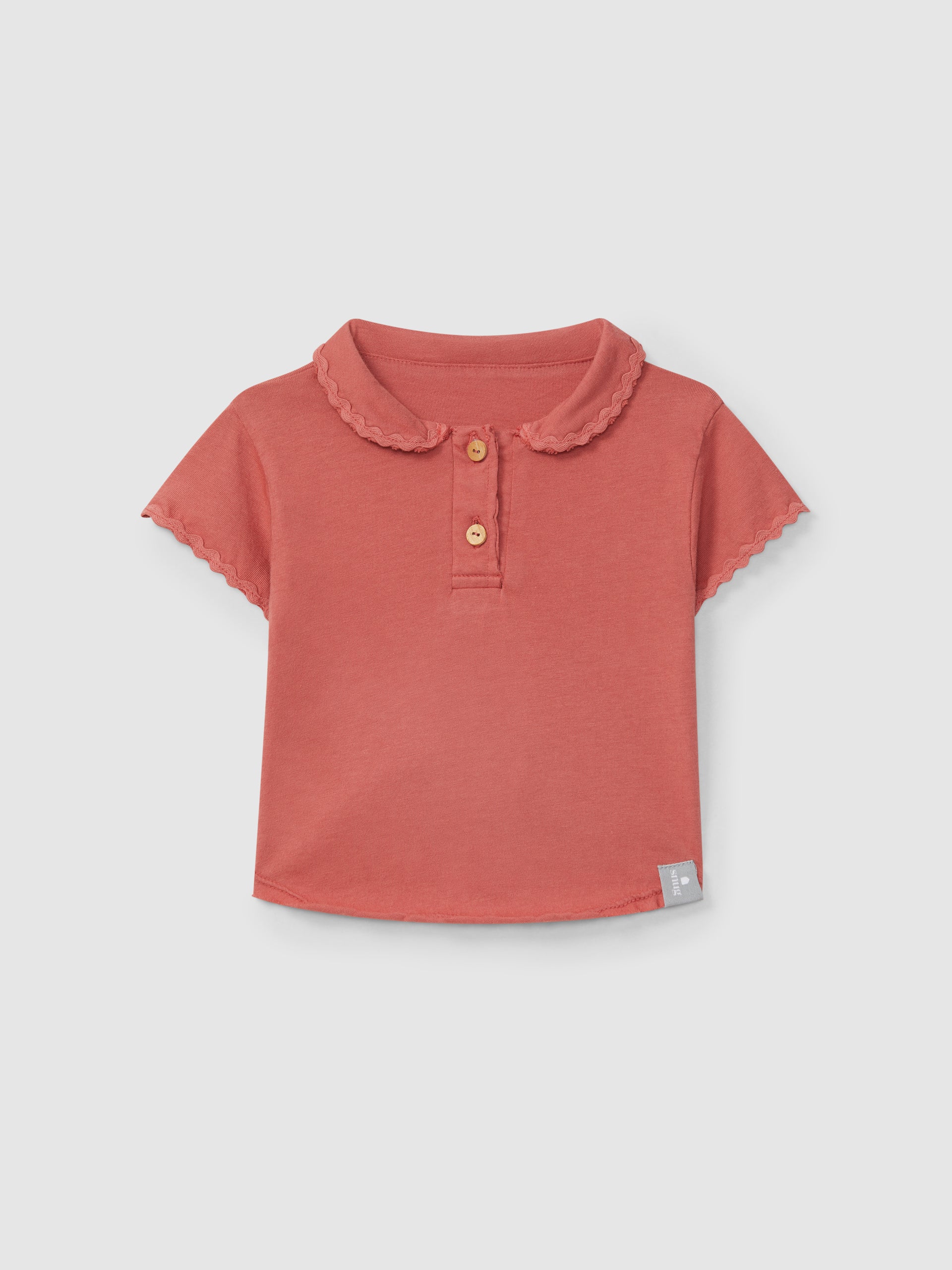 Plain polo shirt with rickrack detail