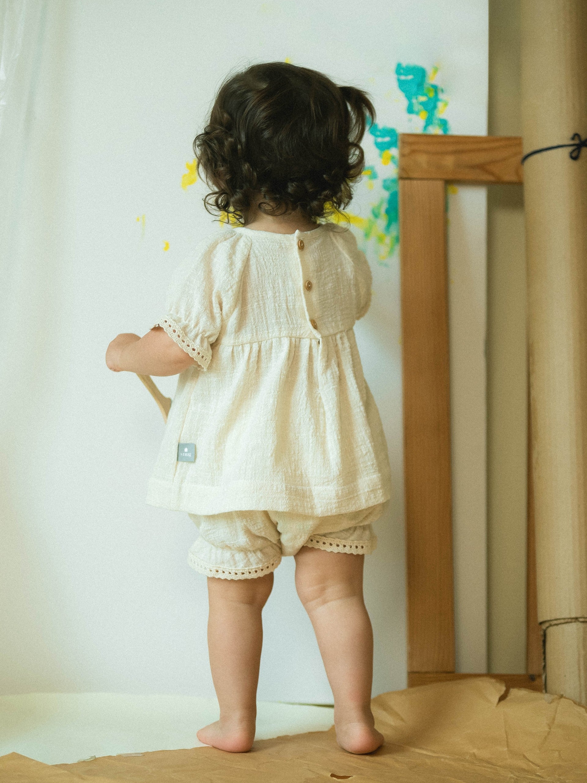 Blouse and shorts set with embroidery and lace details