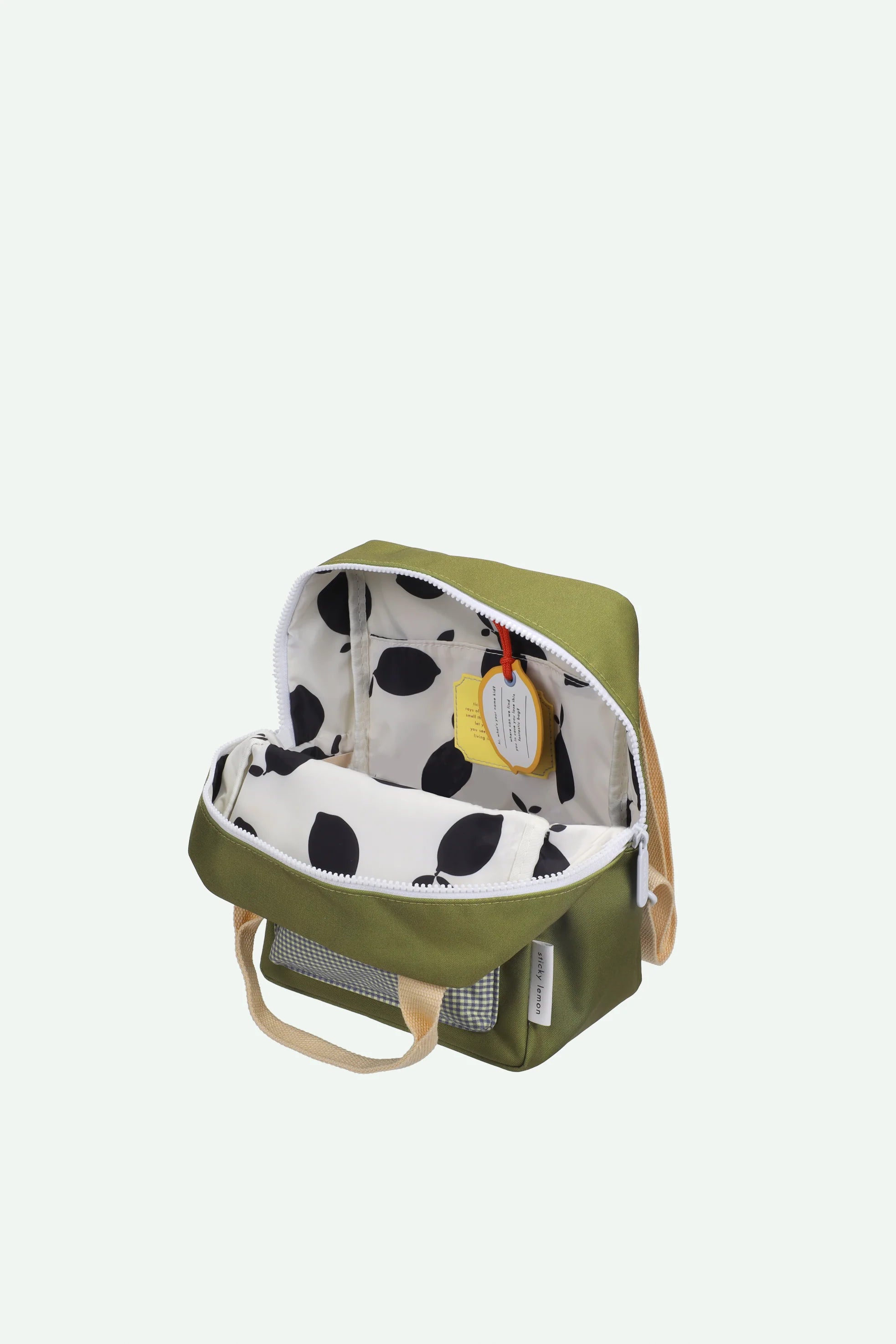 Backpack small envelope tickling grass