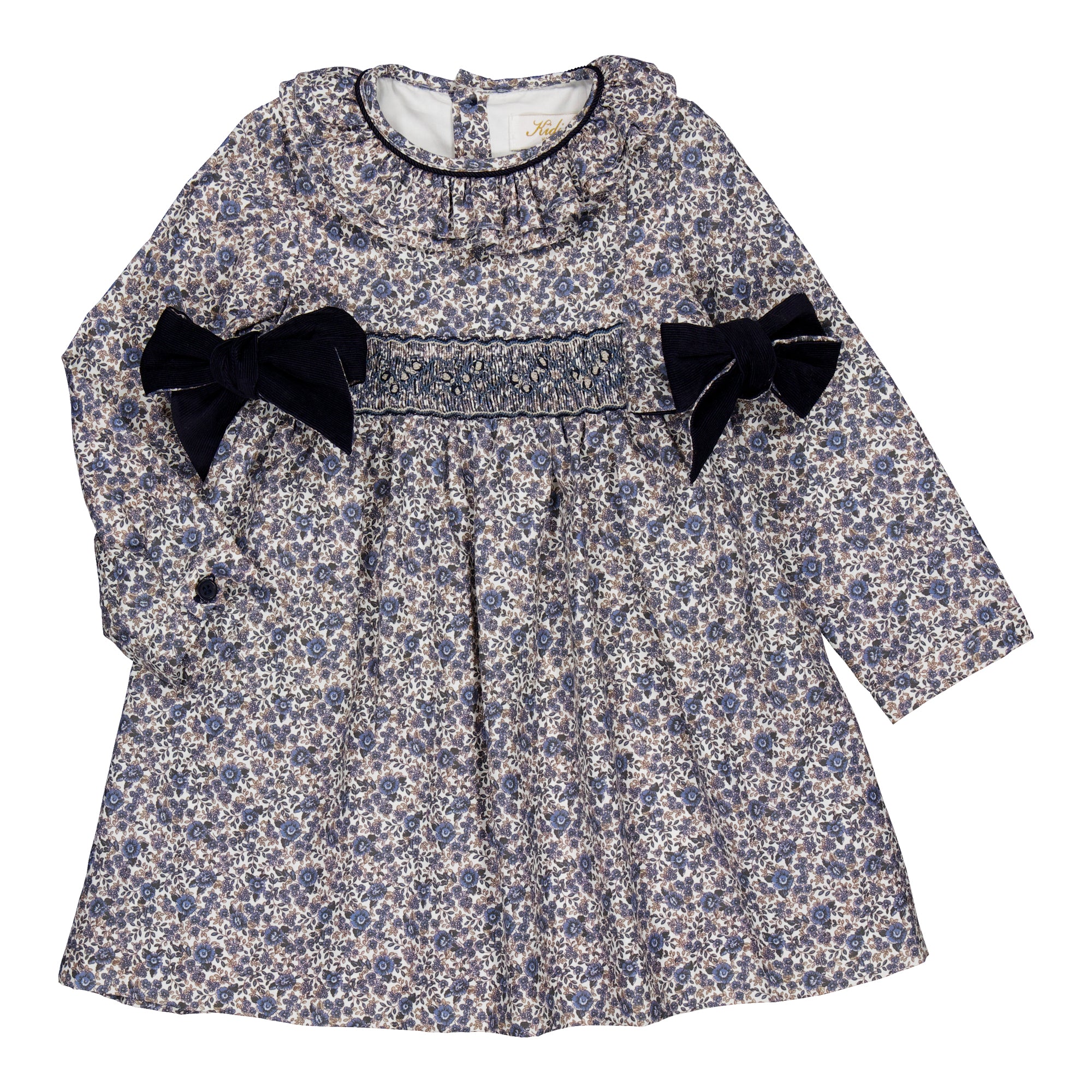 Adriana, smocked dress, in Navy blue print with Navy Corduroy bows