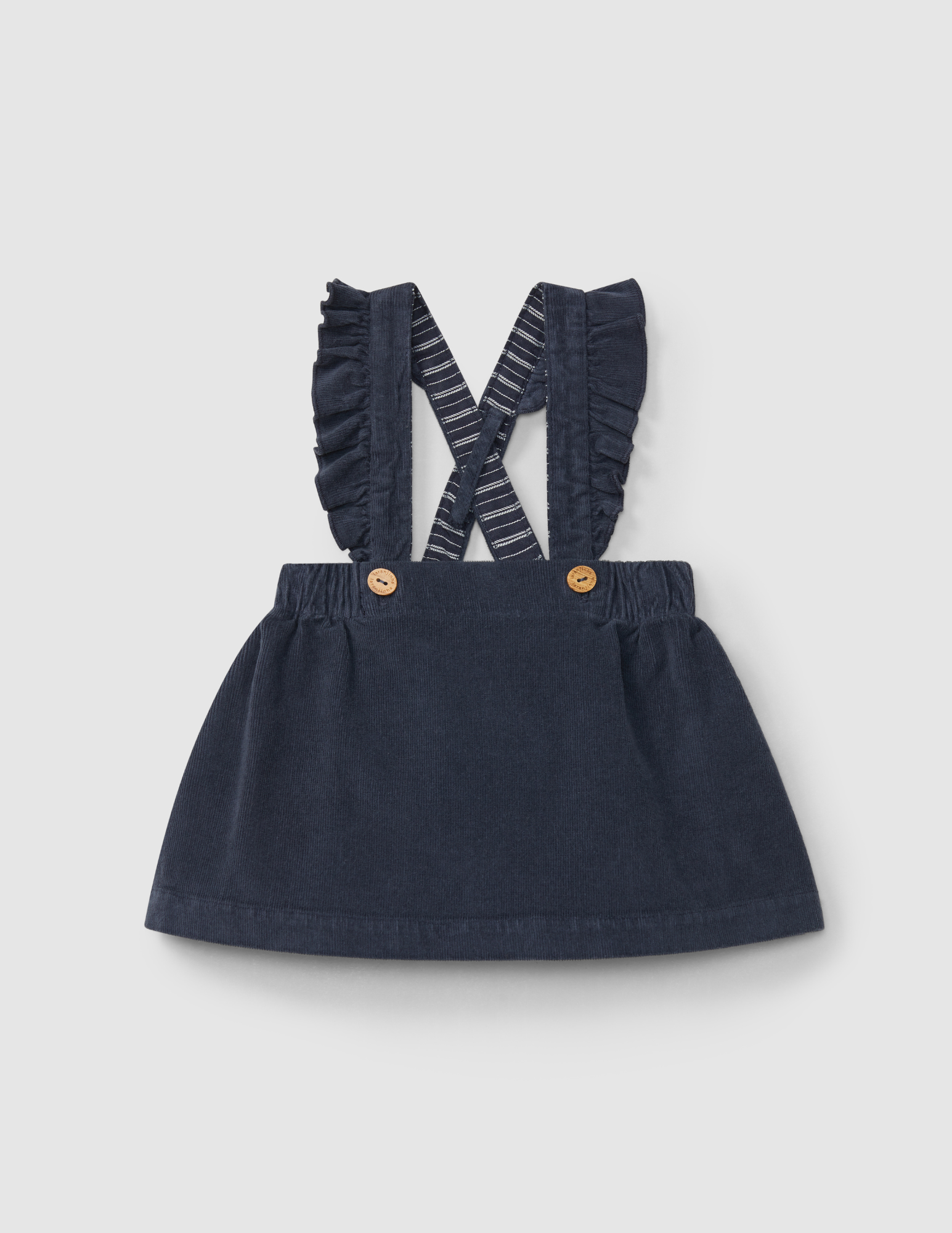 Conjunto Falda con peto y Body-blusa con cuello de volante bordado