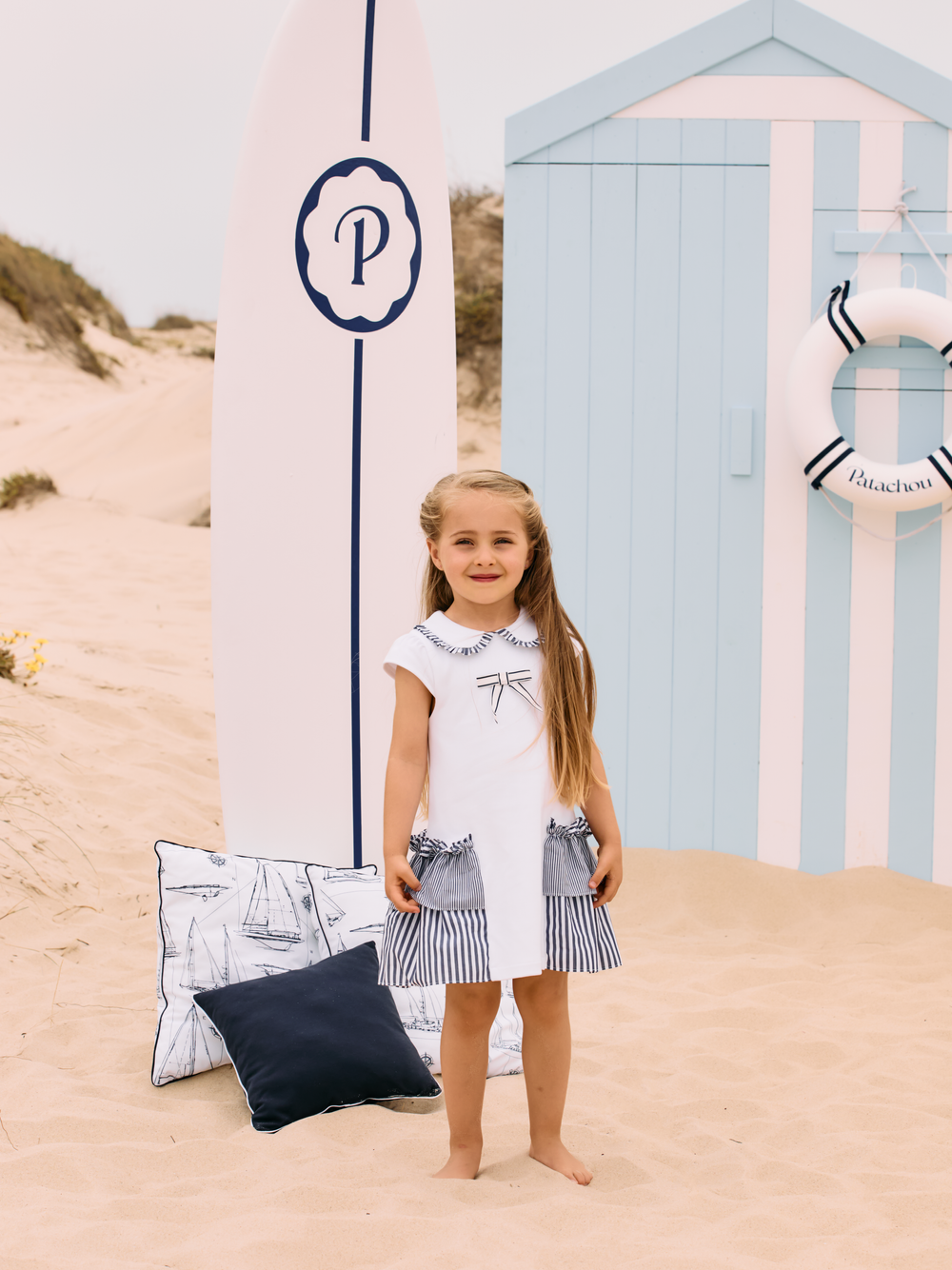White dress with side frills