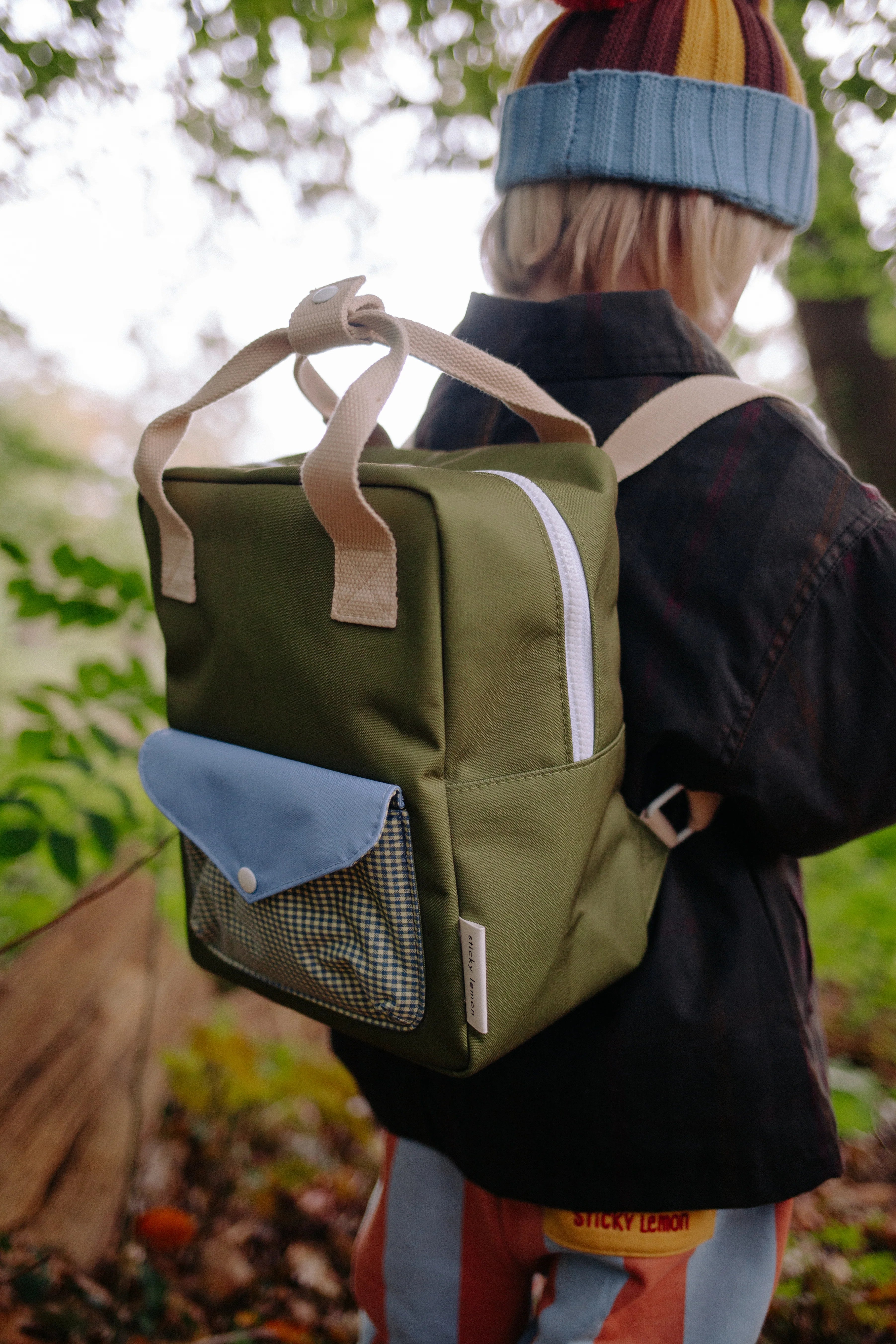 Backpack small envelope tickling grass