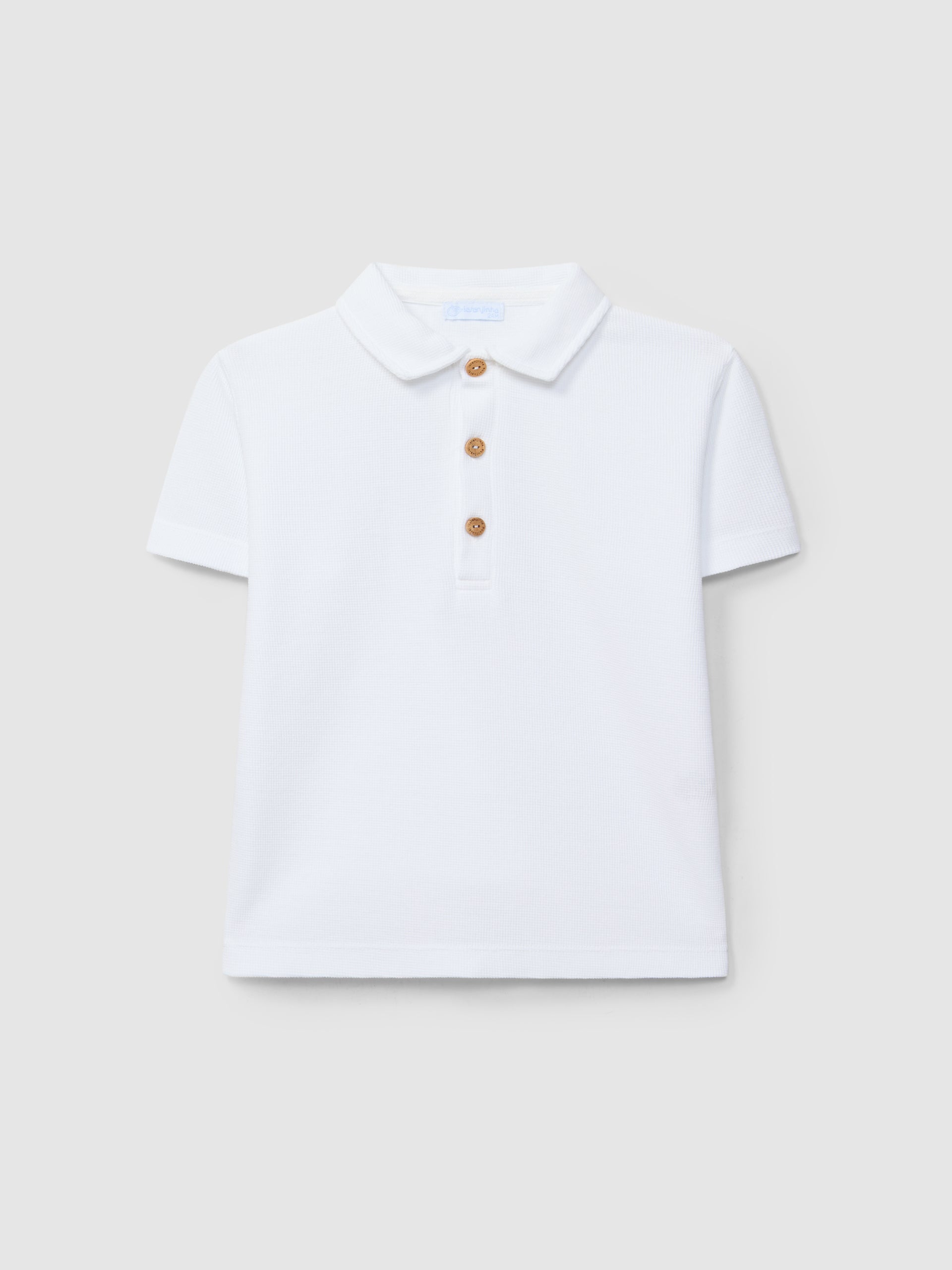 Polo liso en punto gofre Blanco