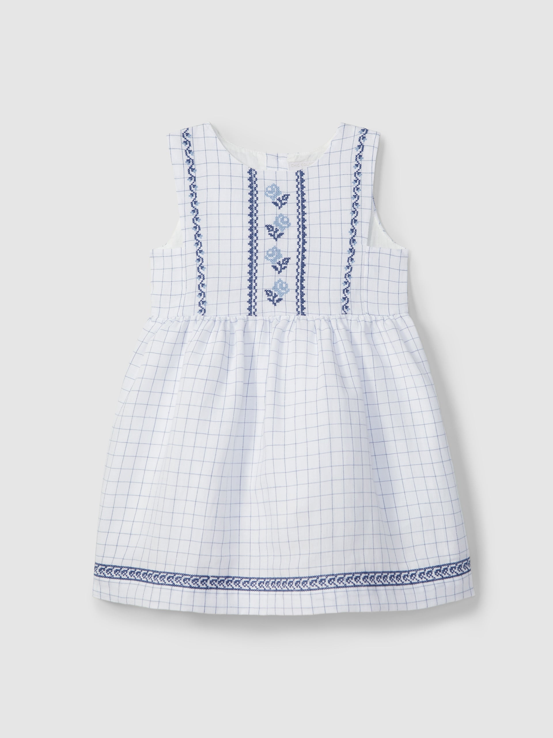 Checkered fabric dress with cross stitch embroidery