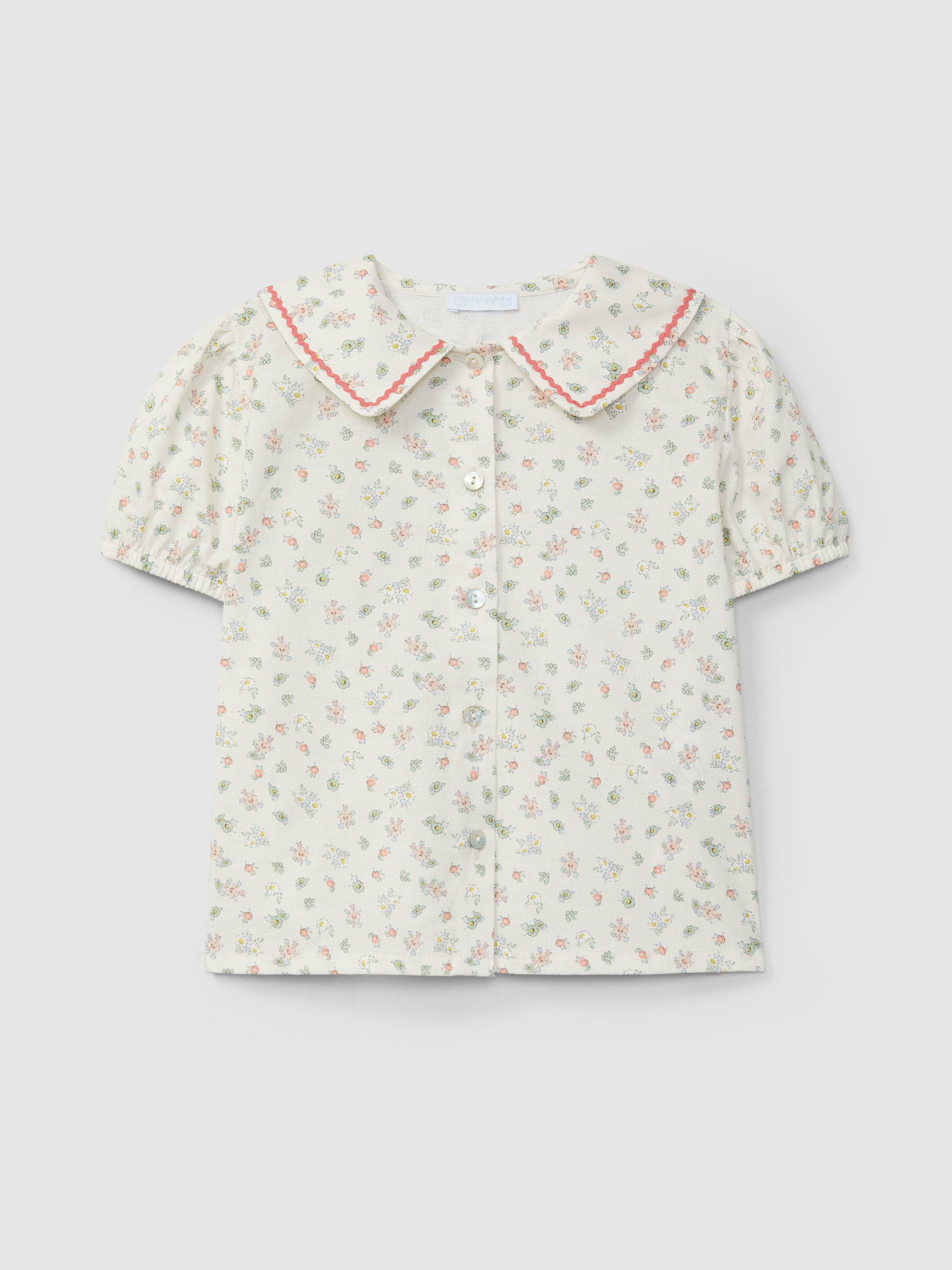 Conjunto Corto Pull-Up en Naranja y Blusa Estampado Floral