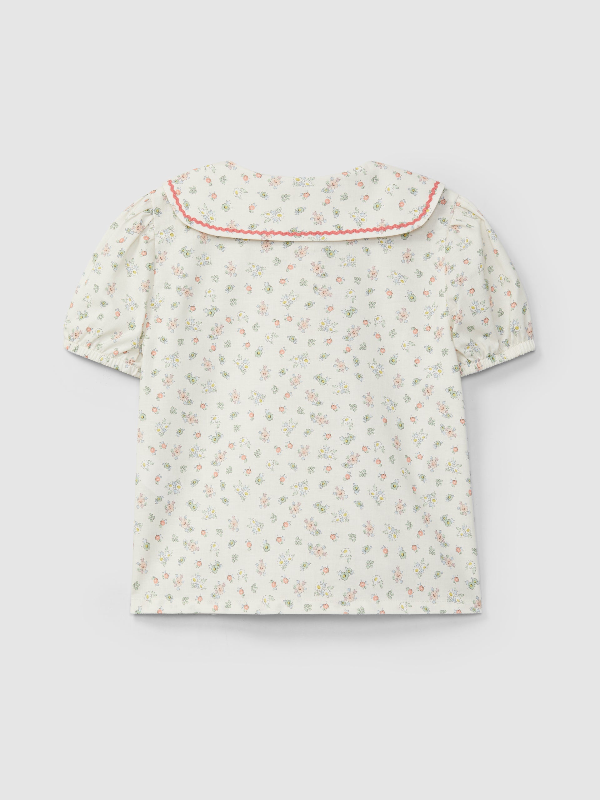 Conjunto Corto Pull-Up en Naranja y Blusa Estampado Floral