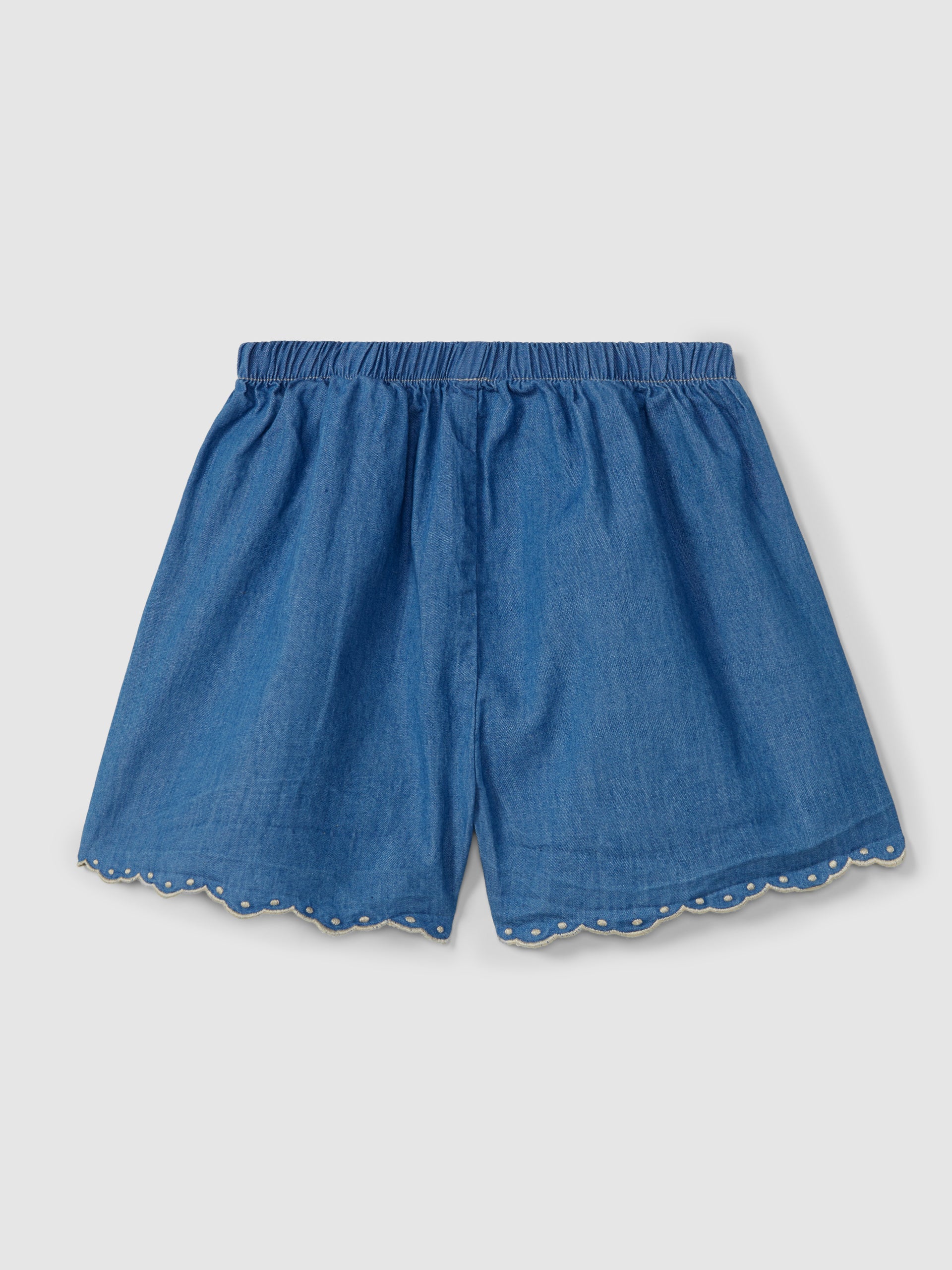 Textured striped fabric top with decorative drawstring and Thin denim pull-up shorts with embroidered details
